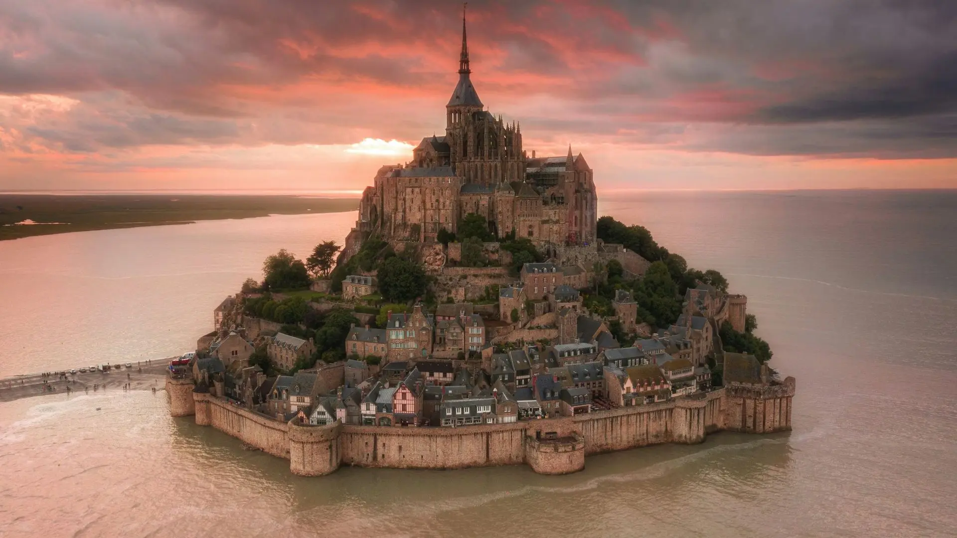 Mont Saint-Michel abbey on its island at sunset Mont Saint-Michel abbey on its island at sunset