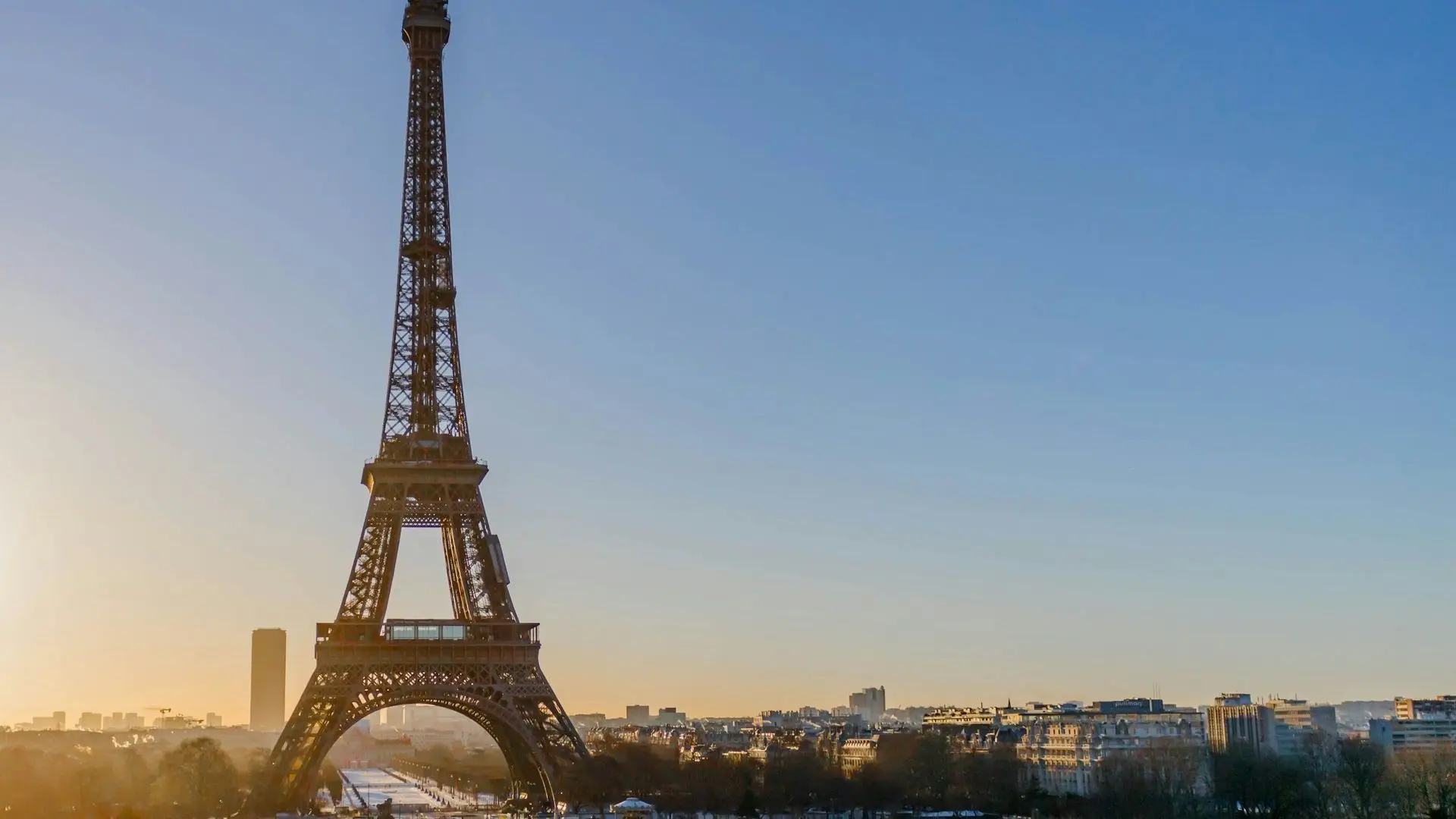 Eiffel Tower against a clear evening sky